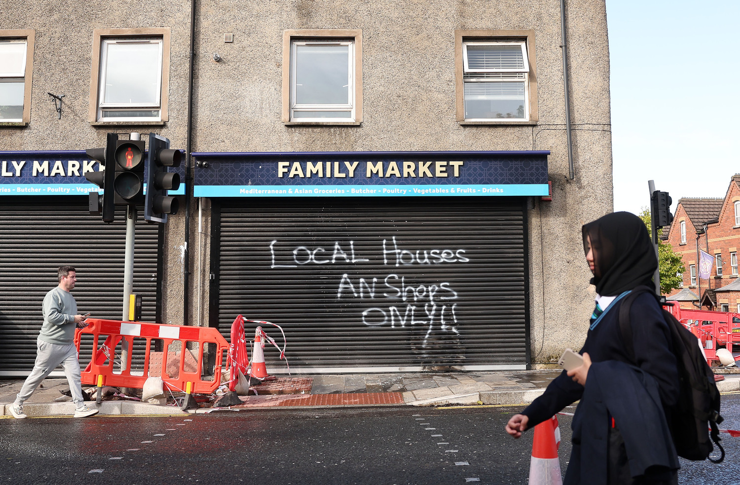 A shop in Belfast which had been set on fire in a racially-motivated attack in September 2023. The shop had been attacked four times in the preceding fortnight. Photo by Jonathan Porter, Press Eye A shop in Belfast which had been set on fire in a racially-motivated attack in September 2023. The shop had been attacked four times in the preceding fortnight. Photo by Jonathan Porter, Press Eye